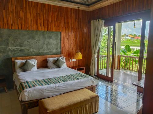 Llit o llits en una habitació de La Pan Nam Exotic Villas and Spa