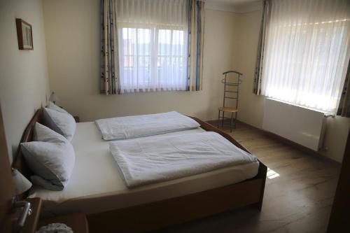 En eller flere senge i et værelse på Ferienwohnungen Herzog