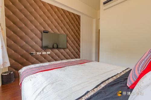Una cama o camas en una habitación de Atayal Villa