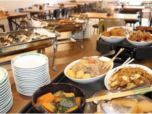 a buffet with many different types of food on a table at Az Inn Fukui - Vacation STAY 65935v in Fukui