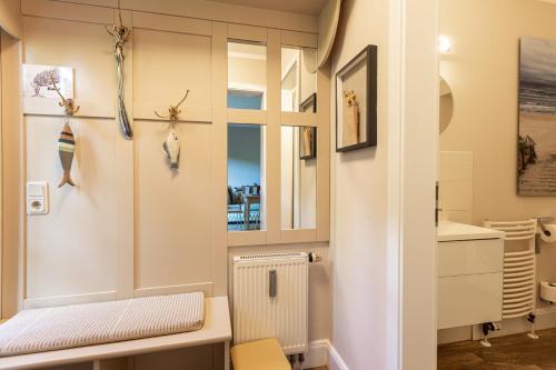 a room with a window and a radiator at Christian in Ahrenshoop