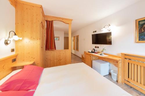 Monza Dolomites Hotelにあるベッド