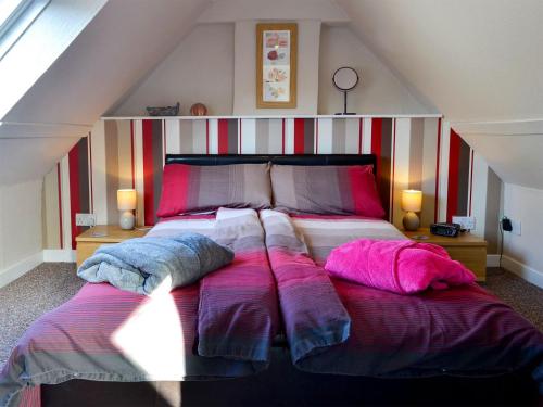 Postel nebo postele na pokoji v ubytování Coldhome Cottage