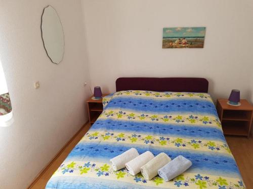 מיטה או מיטות בחדר ב-Apartmani Jereb