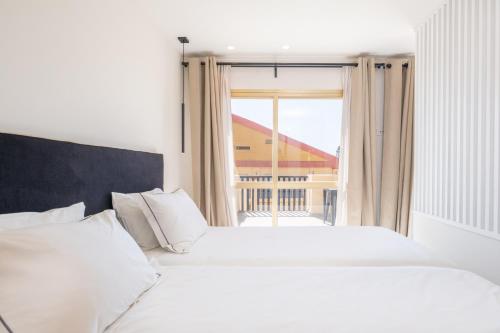 Postel nebo postele na pokoji v ubytování SÖK LA ROMANA seafront Marbella