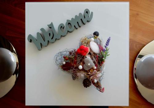 a card with a heart with a sympathy sign and flowers at WEITBLICK "entspannen - wohlfühlen - aktiv erholen" in Elzach