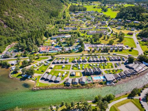 an aerial view of a park with a lot of cars at Mikkelparken Ferietun in Kinsarvik