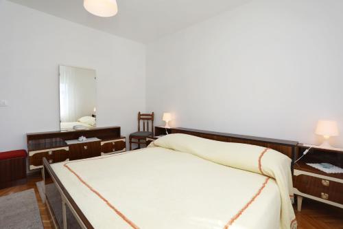 Postel nebo postele na pokoji v ubytování Apartment Falichi