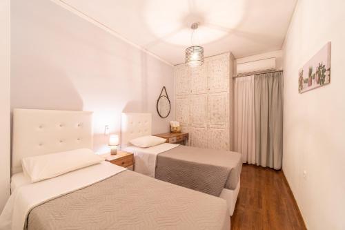 Ένα ή περισσότερα κρεβάτια σε δωμάτιο στο Diamond Suite