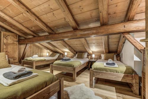 Кровать или кровати в номере Chalet Tissières