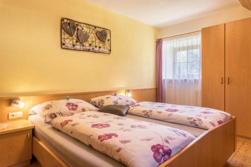 Postel nebo postele na pokoji v ubytování Oberwieserhof App 1