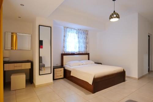 Postel nebo postele na pokoji v ubytování Hotel Jali