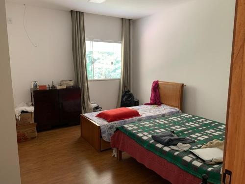 Cama o camas de una habitación en Hotel Fazenda Selva do Mato Limpo