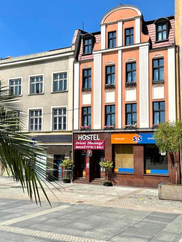 a building with a hostel on the side of a street at Hostel Kamienica Rynek 7 in Katowice