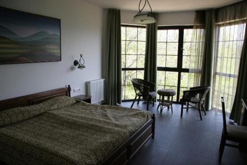 Ένα ή περισσότερα κρεβάτια σε δωμάτιο στο Milkana Hotel