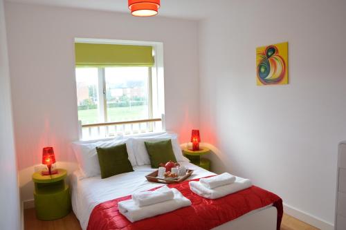 En eller flere senge i et værelse på Parrotfish Bay