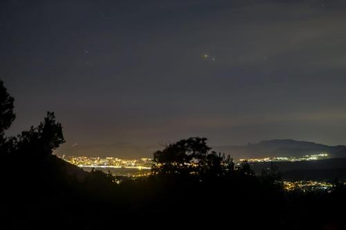 a view of a city at night with lights at La Bastide du Beausset-Vieux in Le Beausset