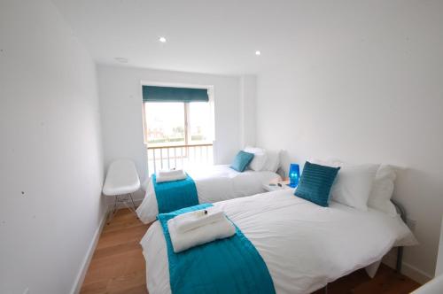 En eller flere senge i et værelse på Seal Cove