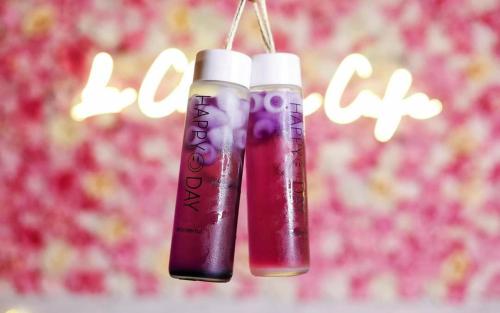 two tubes of lip gloss hanging from a string at La Choeben Suites in Calbayog City