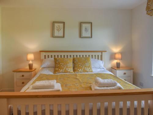 Voodi või voodid majutusasutuse Outhwaite Cottage toas
