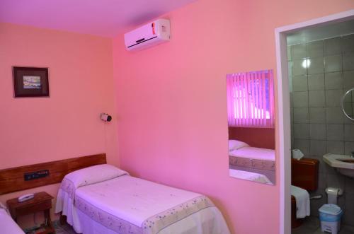 Postel nebo postele na pokoji v ubytování Hotel Vivo