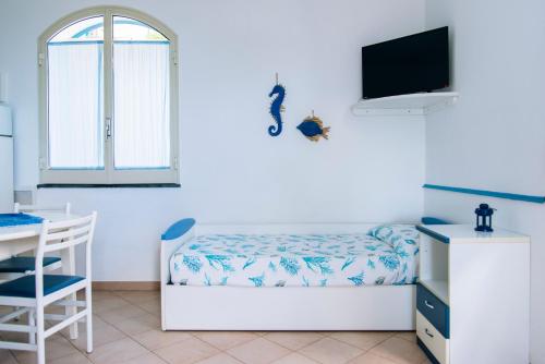 Cama o camas de una habitación en Mistral Residence