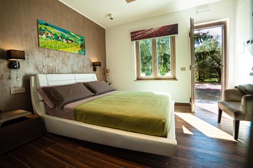 מיטה או מיטות בחדר ב-Terre Etrusche Guest House-Terme -3 minuti da Viterbo centro