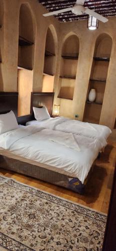 Ένα ή περισσότερα κρεβάτια σε δωμάτιο στο Bait Baityn بيت البيتين