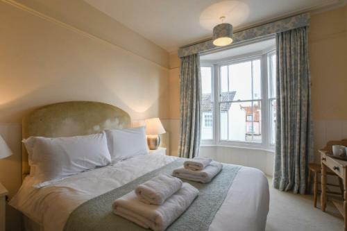 Ένα ή περισσότερα κρεβάτια σε δωμάτιο στο Walton House, Southwold