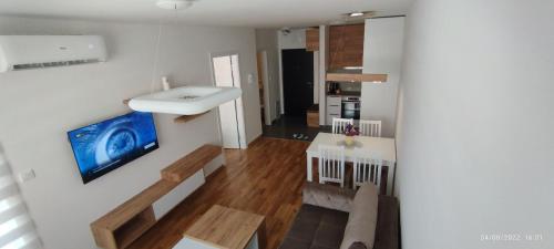 TV a/nebo společenská místnost v ubytování DuAl apartman