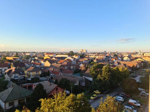 a view of a city with houses and cars at STUDIO 33 in Šabac