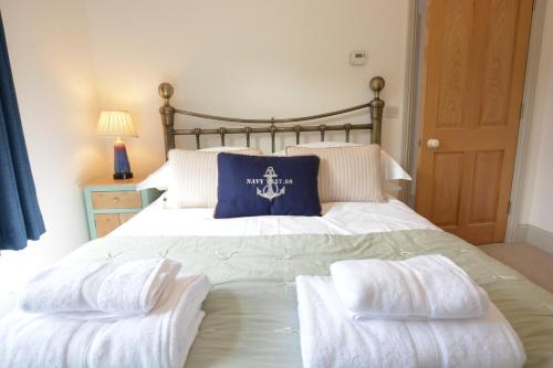 Ein Bett oder Betten in einem Zimmer der Unterkunft Badminton, Thorpeness