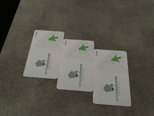 three cards on a table with green arrows on them at Apartment OneClickRenrt Oasis in Chişinău