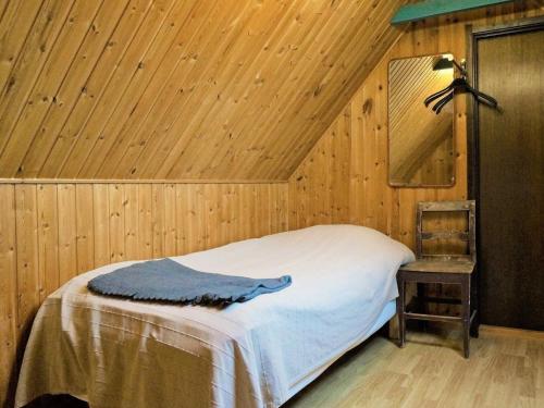 Ένα ή περισσότερα κρεβάτια σε δωμάτιο στο 6 person holiday home in LAHOLM