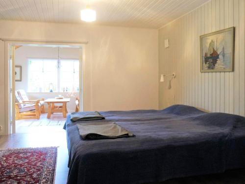 Ένα ή περισσότερα κρεβάτια σε δωμάτιο στο 6 person holiday home in LAHOLM