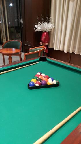 a pool table with a pile of balls on it at SPA Hotel Medicus in Varshets
