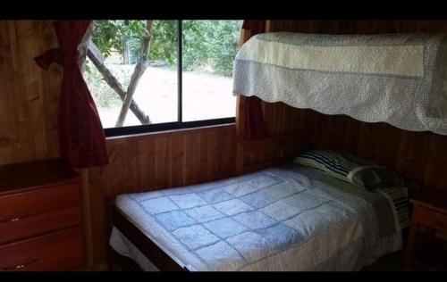 Cama o camas de una habitación en Cabañas Antonia Trinidad