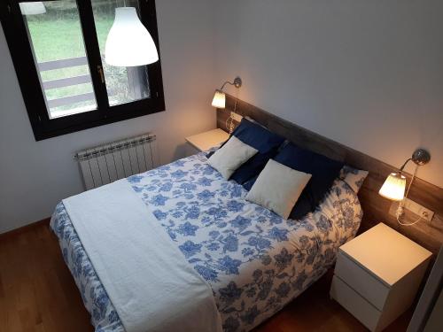 Postel nebo postele na pokoji v ubytování L'Artiga