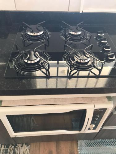 Dapur atau dapur kecil di Apartamento com vista para o mar em Capão da Canoa!