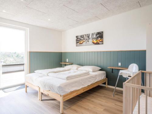 Katil atau katil-katil dalam bilik di 8 person holiday home in Tarm