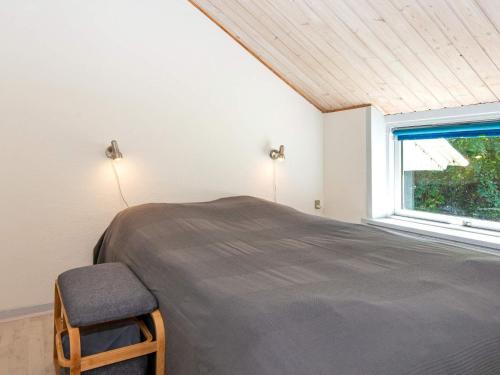 En eller flere senger på et rom på Holiday home Oksbøl LXXXIII
