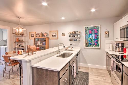 a kitchen with a sink and a counter top at Quiet Home by Dtwn Livingston Hike, Fish and Ski! in Livingston