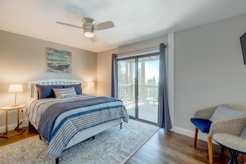 a bedroom with a bed and a sliding glass door at Casa Azul in Incline Village