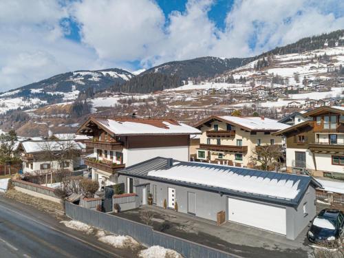 a view of a town with snow covered buildings at Studio 7 in Niedernsill
