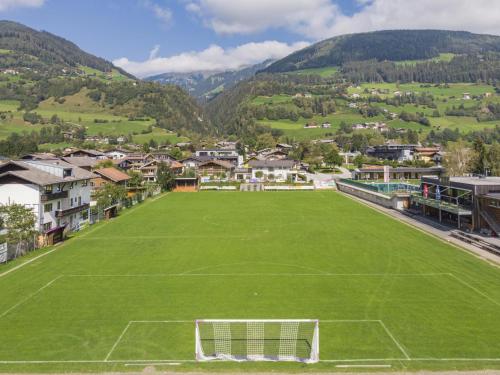 an aerial view of a soccer field in a city at Tobias Top 2 in Bramberg am Wildkogel