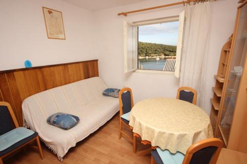 Postel nebo postele na pokoji v ubytování Apartments with WiFi Vis - 8435
