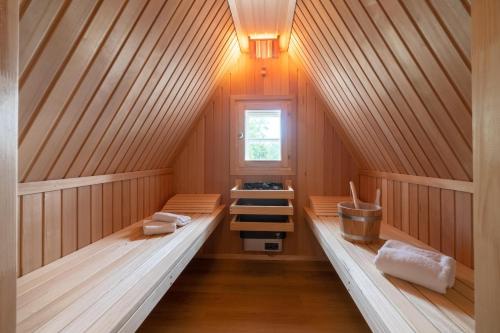 Ένα ή περισσότερα κρεβάτια σε δωμάτιο στο Villa Westküste