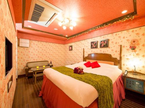 Postel nebo postele na pokoji v ubytování Hotel Gallery (Adult Only)