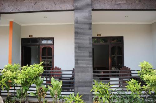 a view of the front porch of a house at Hotel Diana 1 in Denpasar