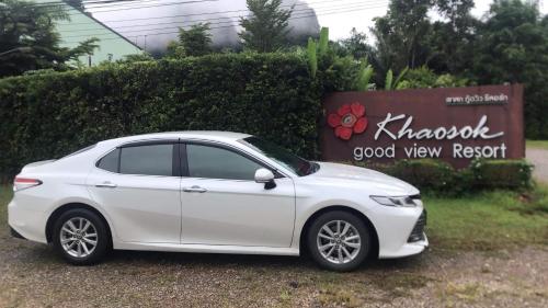 a white car parked in front of a good view resort at Khaosok Good view Resort - SHA PLUS in Khao Sok